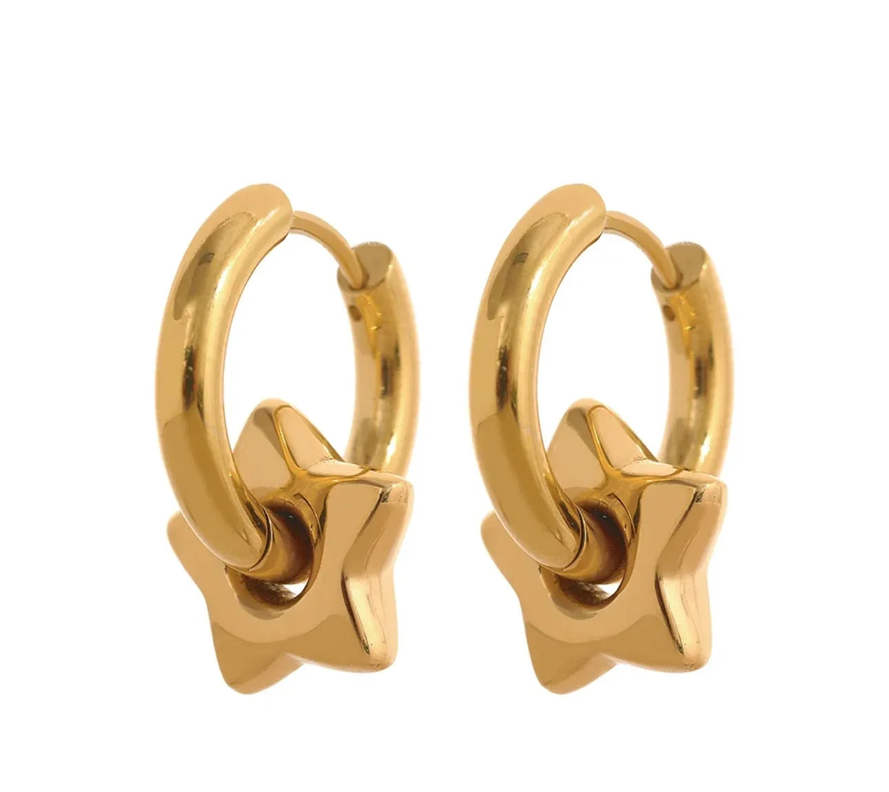Pair of gold hoop earrings with dangling star charms, minimalist jewelry on white background